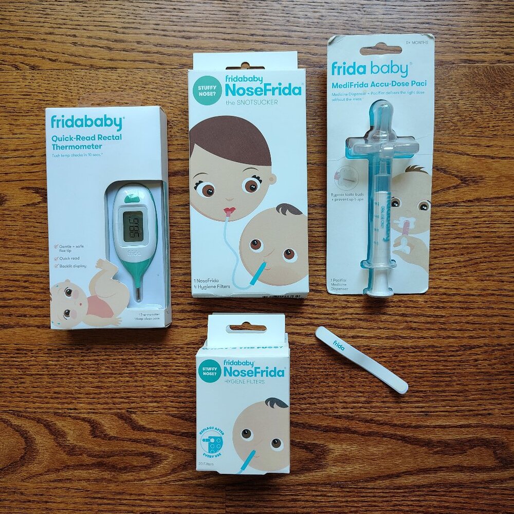 Fridababy thermometer, pacifier medicine dispenser, snotsucker and filters. New